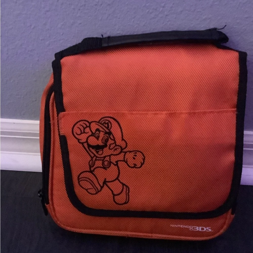 2DS/3DS orange and black hand bag.